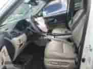 2021 Honda Pilot Touring 8-Passenger z VIN 5FNYF5H94MB042955, wystawiony jako Copart lot #62386735 z przebiegiem 58 976 mil mil oraz Szkoda całkowita • Salvage title. Historia ofert i sprzedaży dostępna na DreamBid. Obrazek 7.