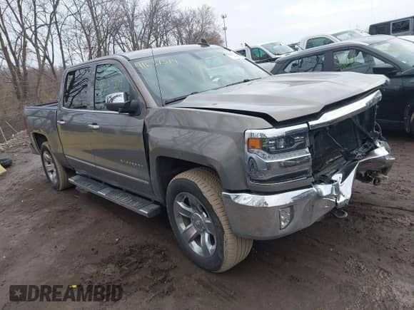 2017 Chevrolet Silverado 1500 LTZ z VIN 3GCUKSEC7HG216249, wystawiony jako IAAI lot #41637379 z przebiegiem 131 866 mil mil oraz . Historia ofert i sprzedaży dostępna na DreamBid. Obrazek 1.