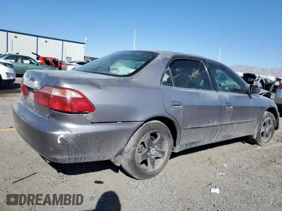 2000 Honda Accord LX с VIN 1HGCG1644YA012541, выставлен на аукционе Copart как лот 82137065 с пробегом 209 226 миль миль и Списание • Salvage title. История ставок и продаж доступна на DreamBid. Изображение 3.