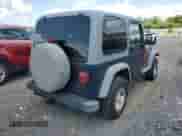 2005 Jeep Wrangler X с VIN 1J4FA39S25P303044, выставлен на аукционе Copart как лот 65637065 с пробегом 127 545 миль миль и Списание • Salvage title. История ставок и продаж доступна на DreamBid. Изображение 3.