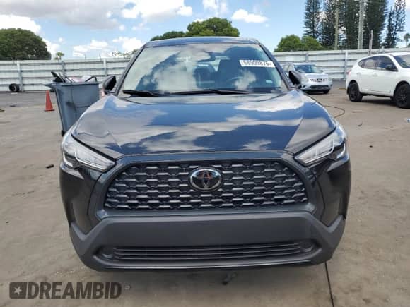 2023 Toyota Corolla Cross L with VIN 7MUAAAAGXPV060495, listed as a Copart auction lot 68909875 with 7,502 mi miles and Non repairable. Bid and sale history available at DreamBid. Image 5.