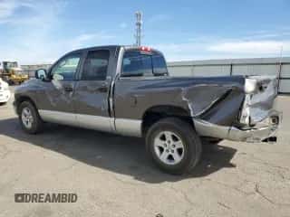 2002 Dodge RAM with VIN 1B7HA18N12J110333, listed as a Copart auction lot 76094054 with 292,567 mi miles and Salvage title. Bid and sale history available at DreamBid. Image 2.