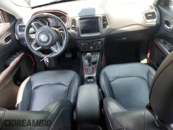 2017 Jeep Compass Trailhawk with VIN 3C4NJDDB6HT631761, listed as a Copart auction lot 62759555 with 94,528 mi miles and Salvage title. Bid and sale history available at DreamBid. Image 8.