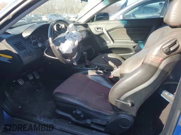2005 Hyundai Tiburon GT с VIN KMHHN65F35U169736, выставлен на аукционе Copart как лот 47422885 с пробегом 136 205 миль миль и Чистый • Clean title. История ставок и продаж доступна на DreamBid. Изображение 7.