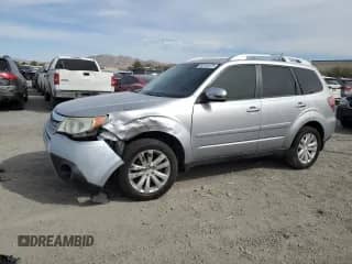2012 Subaru Forester X Touring z VIN JF2SHAGC6CH461380, wystawiony jako Copart lot #50102375 z przebiegiem 129 385 mil mil oraz Szkoda całkowita • Salvage title. Historia ofert i sprzedaży dostępna na DreamBid. Obrazek 1.