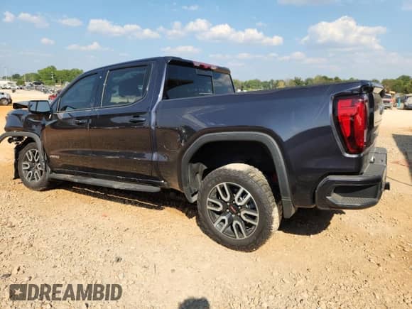 2024 GMC Sierra 1500 AT4 with VIN 3GTUUEEL1RG356892, listed as a Copart auction lot 81197855 with 11,590 mi miles and Salvage title. Bid and sale history available at DreamBid. Image 2.
