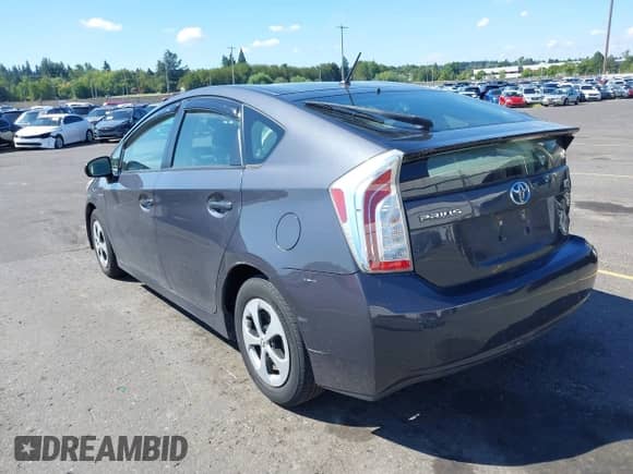 2012 Toyota Prius One with VIN JTDKN3DU1C5472644, listed as a IAAI auction lot 43022818 with 123,803 mi miles and . Bid and sale history available at DreamBid. Image 3.