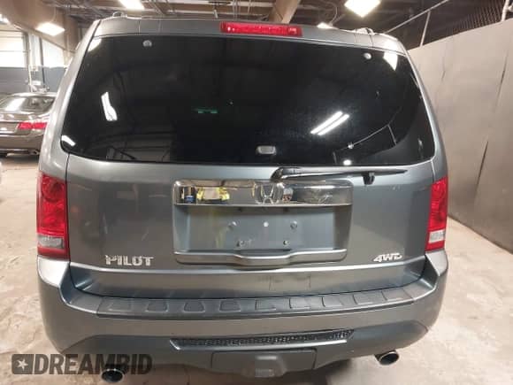 2013 Honda Pilot EX-L with VIN 5FNYF4H74DB055262, listed as a IAAI auction lot 42515947 with 229,037 mi miles and . Bid and sale history available at DreamBid. Image 16.