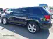 2009 Jeep Grand Cherokee with VIN 1J8HR78W89C520526, listed as a IAAI auction lot 43193483 with 102,738 mi miles and . Bid and sale history available at DreamBid. Image 15.