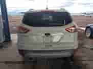 2014 Ford Escape SE z VIN 1FMCU0G92EUB31870, wystawiony jako Copart lot #81413275 z przebiegiem 78 943 mil mil oraz Szkoda całkowita • Salvage title. Historia ofert i sprzedaży dostępna na DreamBid. Obrazek 6.