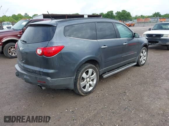 2009 Chevrolet Traverse LTZ with VIN 1GNER33DX9S124927, listed as a IAAI auction lot 42192814 with 185,302 mi miles and . Bid and sale history available at DreamBid. Image 4.