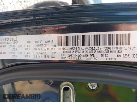 2018 Ram 1500 Rebel with VIN 1C6RR7YT4JS145768, listed as a IAAI auction lot 41593734 with 66,820 mi miles and . Bid and sale history available at DreamBid. Image 9.