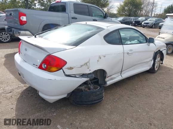 2003 Hyundai Tiburon GT с VIN KMHHN65FX3U034914, выставлен на аукционе IAAI как лот 41299314 с пробегом 204 378 миль миль и . История ставок и продаж доступна на DreamBid. Изображение 4.