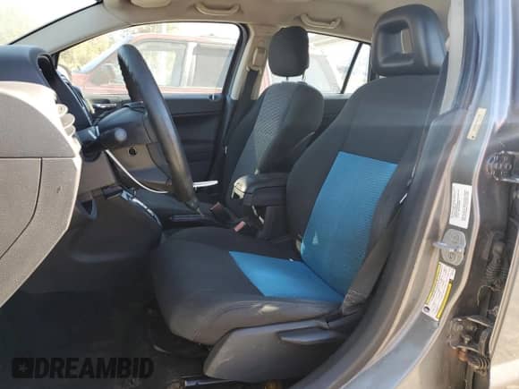 2011 Dodge Caliber Heat with VIN 1B3CB5HA7BD231380, listed as a Copart auction lot 82520765 with 217,144 mi miles and Clean title. Bid and sale history available at DreamBid. Image 7.