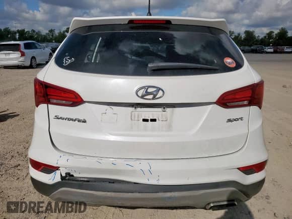 2018 Hyundai Santa Fe 2.4L z VIN 5XYZT3LB8JG560258, wystawiony jako Copart lot #81731355 z przebiegiem 98 270 mil mil oraz Szkoda całkowita • Salvage title. Historia ofert i sprzedaży dostępna na DreamBid. Obrazek 6.