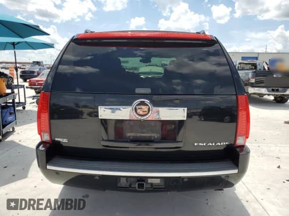 2009 Cadillac Escalade z VIN 1GYFC23219R298328, wystawiony jako Copart lot #62998365 z przebiegiem 238 731 mil mil oraz Czysty tytuł • Clean title. Historia ofert i sprzedaży dostępna na DreamBid. Obrazek 6.