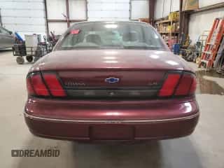 1997 Chevrolet Lumina with VIN 2G1WL52M3V9233150, listed as a Copart auction lot 51259704 with Not provided miles and Salvage title. Bid and sale history available at DreamBid. Image 6.
