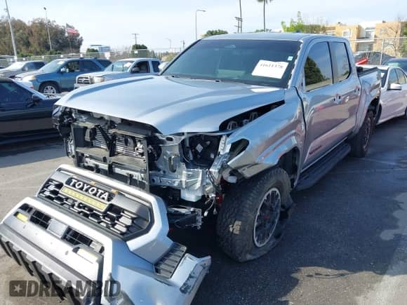 2024 Toyota Tacoma SR5 with VIN 3TMLB5JN6RM022612, listed as a IAAI auction lot 41611378 with 7,275 mi miles and . Bid and sale history available at DreamBid. Image 18.