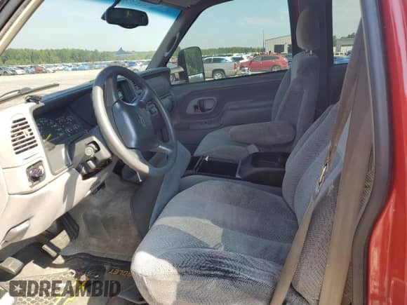 1999 Chevrolet Suburban with VIN 3GNGC26R6XG194781, listed as a Copart auction lot 68814755 with 115,724 mi miles and Salvage title. Bid and sale history available at DreamBid. Image 7.