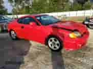 2003 Hyundai Tiburon с VIN KMHHM65D43U038524, выставлен на аукционе Copart как лот 80569804 с пробегом 175 248 миль миль и Списание • Salvage title. История ставок и продаж доступна на DreamBid. Изображение 4.