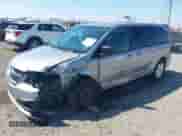 2015 Dodge Grand Caravan SE Plus with VIN 2C4RDGBGXFR540615, listed as a IAAI auction lot 43135303 with 77,597 mi miles and . Bid and sale history available at DreamBid. Image 2.