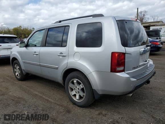 2010 Honda Pilot Touring с VIN 5FNYF4H9XAB021792, выставлен на аукционе Copart как лот 89511745 с пробегом 233 599 миль миль и Списание • Salvage title. История ставок и продаж доступна на DreamBid. Изображение 2.