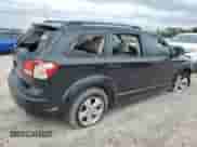 2012 Dodge Journey American Value with VIN 3C4PDCAB1CT169939, listed as a Copart auction lot 65083445 with 180,035 mi miles and Salvage title. Bid and sale history available at DreamBid. Image 3.