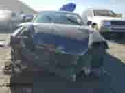 2004 Hyundai Tiburon GT with VIN KMHHN65FX4U108253, listed as a Copart auction lot 77635034 with 34,170 mi miles and Salvage title. Bid and sale history available at DreamBid. Image 5.