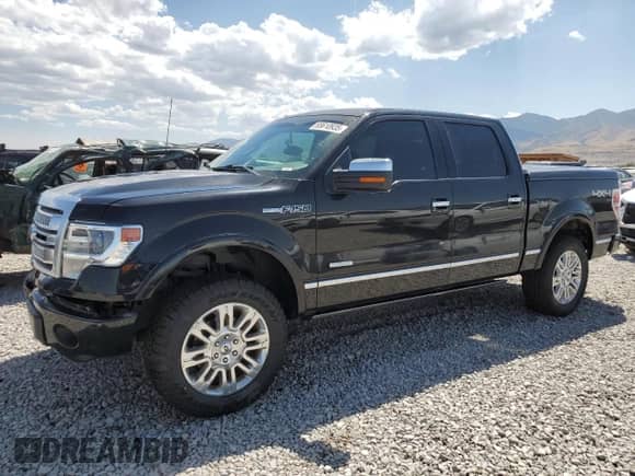 2014 Ford F-150 FX4 with VIN 1FTFW1ET7EFB69518, listed as a Copart auction lot 65610935 with 141,488 mi miles and Salvage title. Bid and sale history available at DreamBid. Image 1.