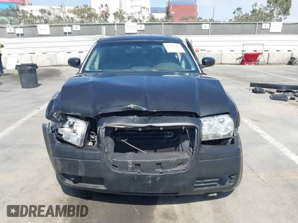 2006 Chrysler 300 C SRT-8 with VIN 2C3LA73W86H518966, listed as a IAAI auction lot 42725107 with 175,474 mi miles and . Bid and sale history available at DreamBid. Image 6.