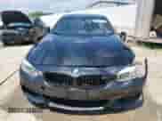 2015 BMW 4 Series 428i xDrive z VIN WBA4C9C54FD330937, wystawiony jako Copart lot #66156155 z przebiegiem 104 805 mil mil oraz Szkoda całkowita • Salvage title. Historia ofert i sprzedaży dostępna na DreamBid. Obrazek 5.