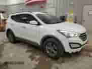 2014 Hyundai Santa Fe с VIN 5XYZUDLBXEG165099, выставлен на аукционе Copart как лот 72031075 с пробегом 88 160 миль миль и Чистый • Clean title. История ставок и продаж доступна на DreamBid. Изображение 4.