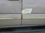 2005 Chevrolet Suburban LT с VIN 1GNEC16Z05J130250, выставлен на аукционе Copart как лот 73827604 с пробегом 166 013 миль миль и На запчасти • Non repairable. История ставок и продаж доступна на DreamBid. Изображение 13.