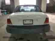1999 Saturn SL with VIN 1G8ZH528XXZ235067, listed as a Copart auction lot 74508564 with 155,180 mi miles and Salvage title. Bid and sale history available at DreamBid. Image 6.