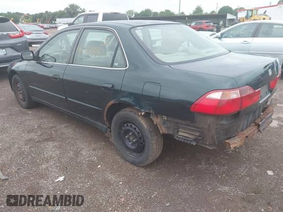 1999 Honda Accord EX with VIN JHMCG5658XC018777, listed as a IAAI auction lot 42761840 with 280,454 mi miles and . Bid and sale history available at DreamBid. Image 3.