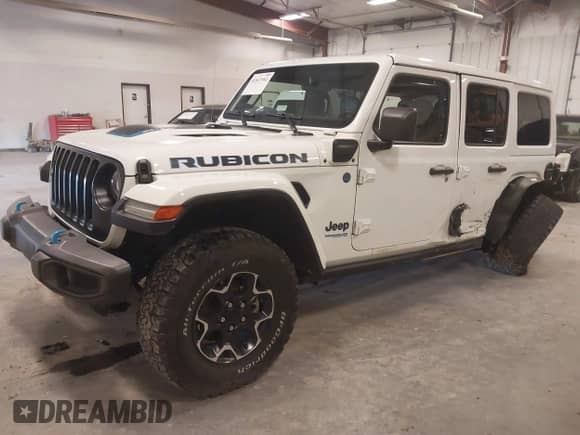 2022 Jeep Wrangler Unlimited Rubicon with VIN 1C4JJXR61NW264155, listed as a IAAI auction lot 41821982 with 48,325 mi miles and . Bid and sale history available at DreamBid. Image 2.
