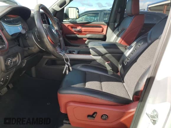 2019 Ram 1500 Rebel z VIN 1C6SRFLT5KN554347, wystawiony jako Copart lot #84263155 z przebiegiem 79 238 mil mil oraz Szkoda całkowita • Salvage title. Historia ofert i sprzedaży dostępna na DreamBid. Obrazek 7.