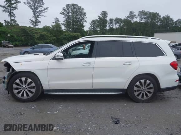 2018 Mercedes-Benz GLS 450 with VIN 4JGDF6EE2JB104367, listed as a IAAI auction lot 42351124 with 141,031 mi miles and . Bid and sale history available at DreamBid. Image 14.