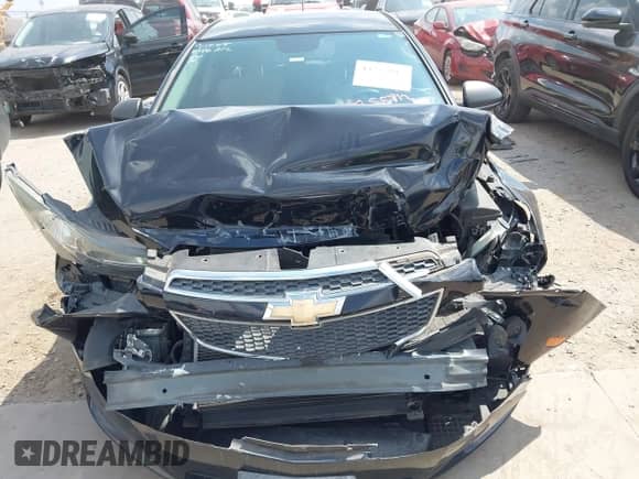 2014 Chevrolet Cruze LS with VIN 1G1PA5SH5E7449175, listed as a IAAI auction lot 43255812 with 93,616 mi miles and . Bid and sale history available at DreamBid. Image 13.