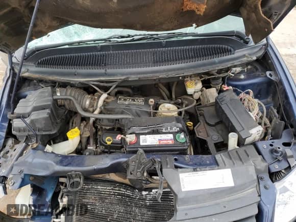 2005 Dodge Caravan SE with VIN 2D4GP24R45R242174, listed as a Copart auction lot 55390344 with 142,188 mi miles and Salvage title. Bid and sale history available at DreamBid. Image 12.