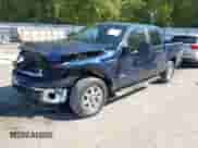 2014 Ford F-150 FX4 with VIN 1FTFW1ET8EFB87719, listed as a IAAI auction lot 43215688 with 165,880 mi miles and . Bid and sale history available at DreamBid. Image 2.