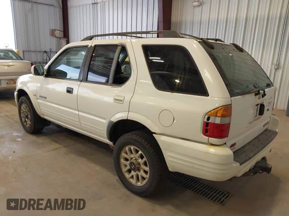 2000 Honda Passport LX with VIN 4S6DM58W9Y4408533, listed as a IAAI auction lot 42888385 with 209,702 mi miles and . Bid and sale history available at DreamBid. Image 3.