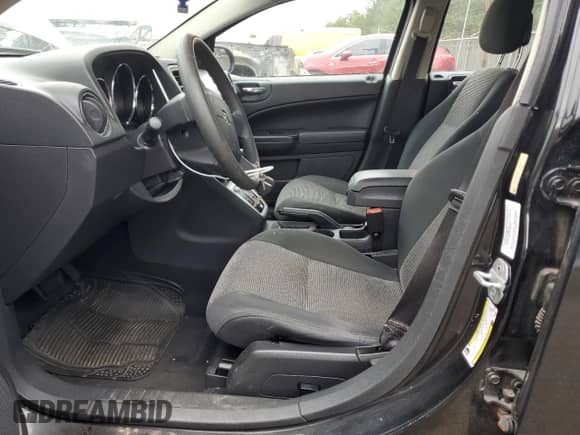 2011 Dodge Caliber Mainstreet z VIN 1B3CB3HA8BD126027, wystawiony jako Copart lot #63360604 z przebiegiem 133 219 mil mil oraz Czysty tytuł • Clean title. Historia ofert i sprzedaży dostępna na DreamBid. Obrazek 7.