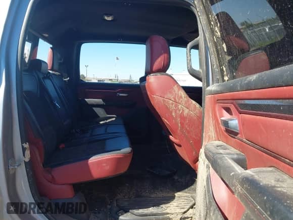 2019 Ram 1500 Rebel z VIN 1C6SRFLTXKN692868, wystawiony jako IAAI lot #43031939 z przebiegiem Nie podano mil oraz . Historia ofert i sprzedaży dostępna na DreamBid. Obrazek 8.