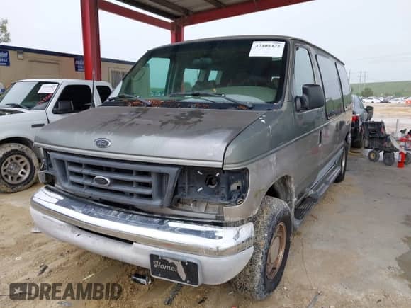 2002 Ford Econoline Cargo Recreational with VIN 1FDRE14L52HB52844, listed as a IAAI auction lot 42408425 with 255,729 mi miles and . Bid and sale history available at DreamBid. Image 2.