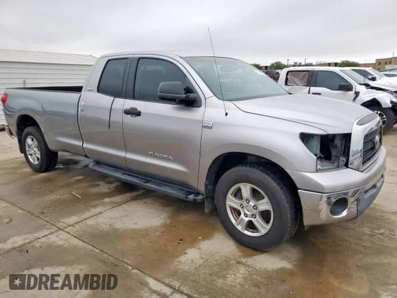 2007 Toyota Tundra SR5 z VIN 5TFST54197X001150, wystawiony jako Copart lot #51142775 z przebiegiem Nie podano mil oraz Czysty tytuł • Clean title. Historia ofert i sprzedaży dostępna na DreamBid. Obrazek 4.