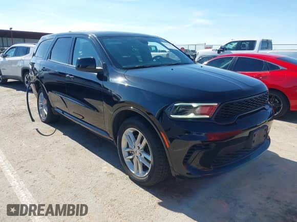 2023 Dodge Durango GT Premium with VIN 1C4RDJDG5PC687929, listed as a IAAI auction lot 42820866 with 51,519 mi miles and . Bid and sale history available at DreamBid. Image 1.