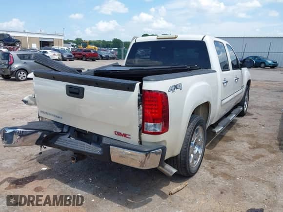 2009 GMC Sierra 1500 SLT with VIN 3GTEK33399G257996, listed as a IAAI auction lot 42735046 with 241,262 mi miles and . Bid and sale history available at DreamBid. Image 4.