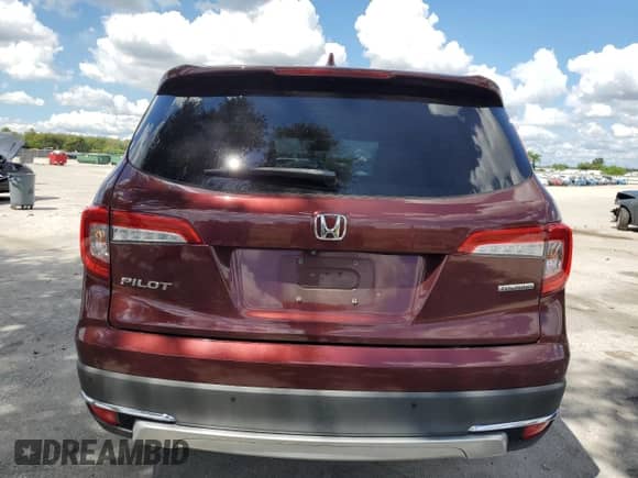 2020 Honda Pilot Touring 7-Passenger z VIN 5FNYF5H6XLB022200, wystawiony jako Copart lot #83790335 z przebiegiem 65 970 mil mil oraz Nie do naprawy • Non repairable. Historia ofert i sprzedaży dostępna na DreamBid. Obrazek 6.