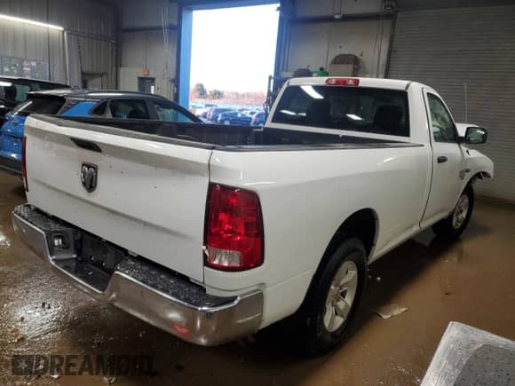 2022 Ram 1500 Tradesman with VIN 3C6JR6DT7NG205584, listed as a Copart auction lot 87599465 with 22,624 mi miles and Salvage title. Bid and sale history available at DreamBid. Image 3.
